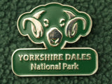 Image shows green enamel lapel badge